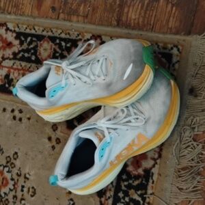 Hoka White and Yellow One Ones